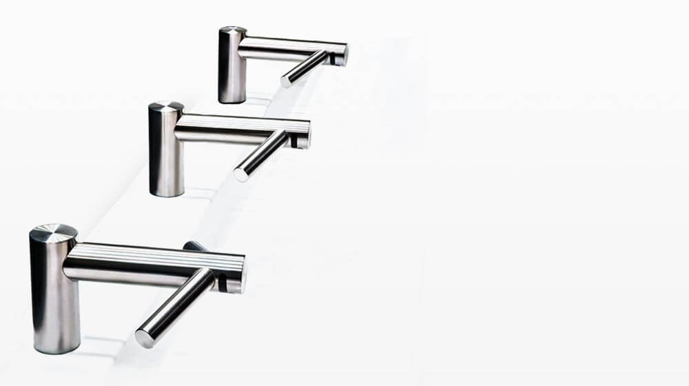 Dyson Airblade Tap hand dryers in a row