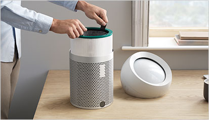 Person changing the filter on their Dyson Pure Cool Me